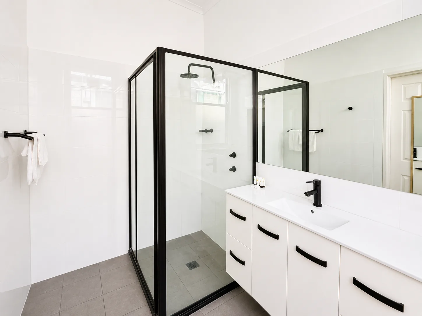 Ensuite with walk-in shower — Queen Deluxe Room at Vine Valley Inn Cessnock