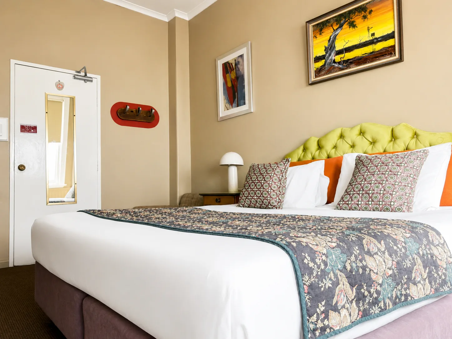 Queen Room at Vine Valley Inn Cessnock with fresh bedding and warm styling
